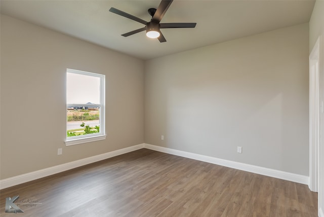 unfurnished room featuring wood-type flooring and ceiling fan