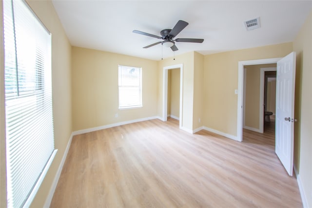 unfurnished bedroom featuring ceiling fan and light hardwood / wood-style floors