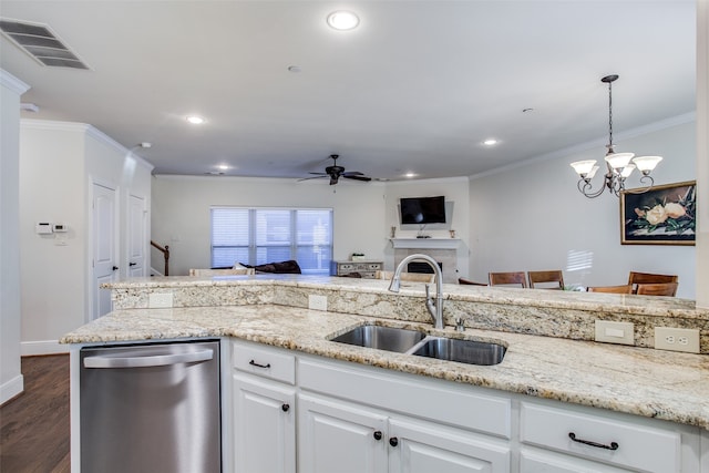 kitchen featuring dark hardwood / wood-style floors, ceiling fan with notable chandelier, dishwasher, sink, and white cabinets