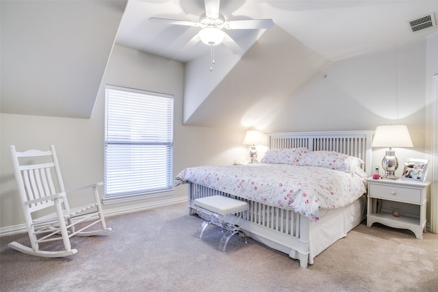 carpeted bedroom featuring lofted ceiling and ceiling fan