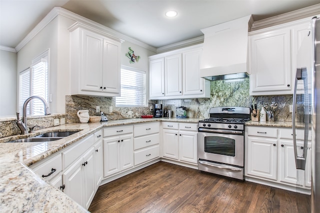 kitchen with premium range hood, sink, dark wood-type flooring, appliances with stainless steel finishes, and white cabinets