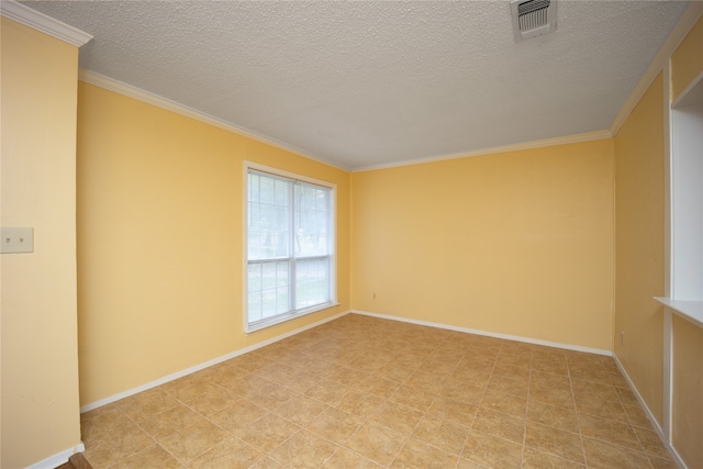 empty room with a textured ceiling and ornamental molding