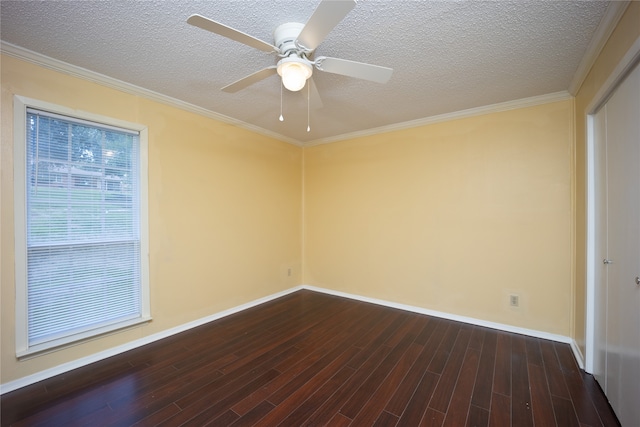 empty room with a textured ceiling, wood-type flooring, and ceiling fan