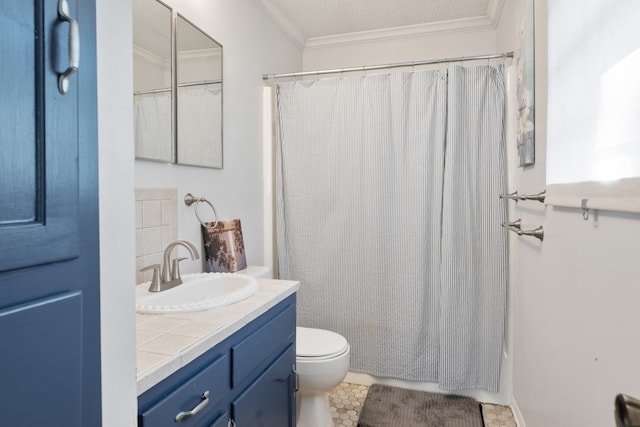 bathroom with vanity, tile patterned flooring, a textured ceiling, crown molding, and toilet