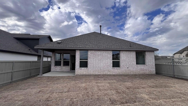 rear view of house featuring a patio area