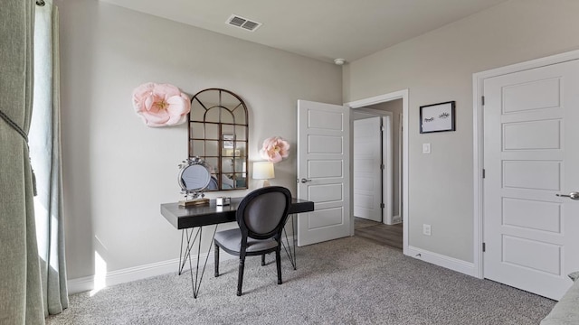 view of carpeted office space