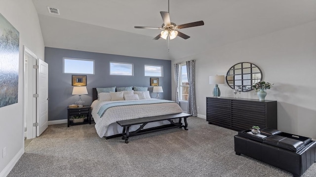 carpeted bedroom featuring ceiling fan and lofted ceiling