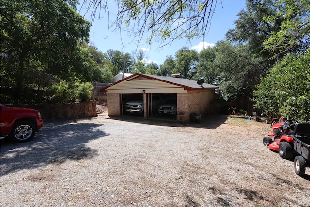 garage featuring a carport