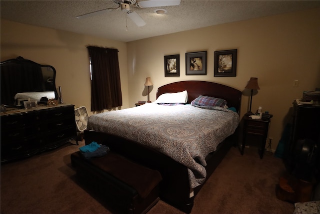 carpeted bedroom with a textured ceiling and ceiling fan