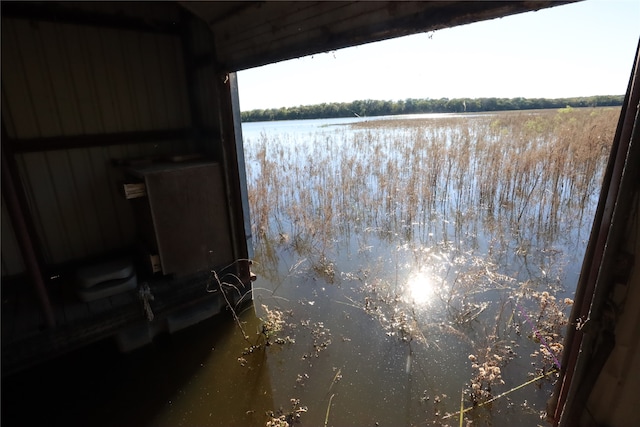 view of dock with a water view