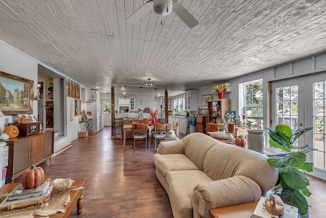 living room featuring ceiling fan, wooden ceiling, and hardwood / wood-style floors