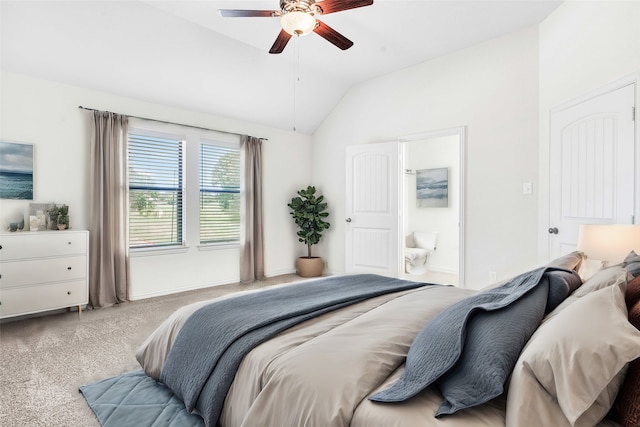 bedroom with ensuite bath, light carpet, lofted ceiling, and ceiling fan