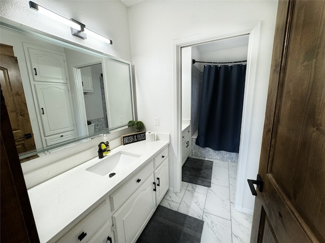 bathroom with vanity and a shower with shower curtain