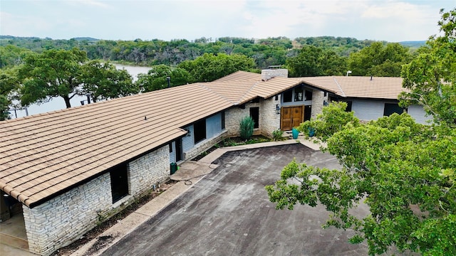 exterior space with a water view