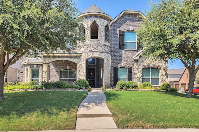 french provincial home with a front yard