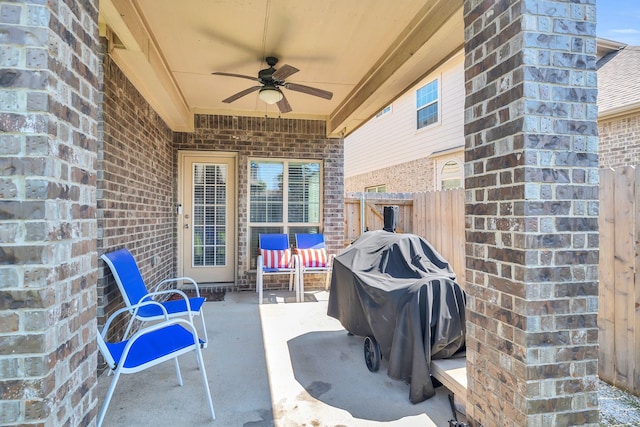 view of patio featuring ceiling fan