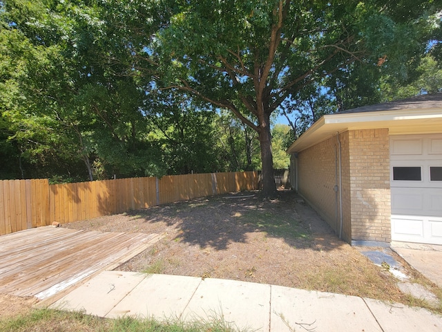 view of yard with a garage