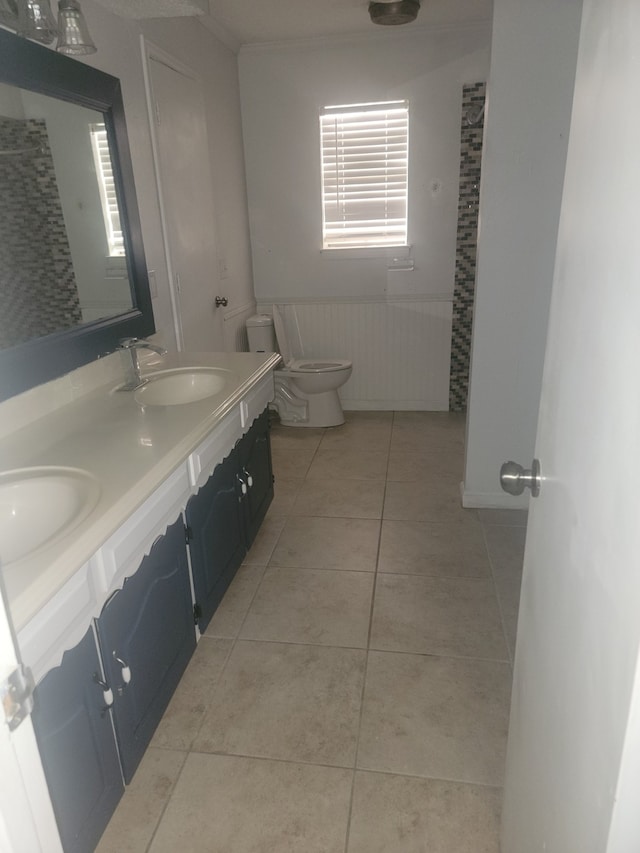 bathroom featuring vanity, toilet, and tile patterned floors