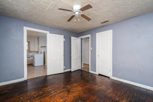 unfurnished bedroom with ensuite bath, a textured ceiling, ceiling fan, and dark hardwood / wood-style floors