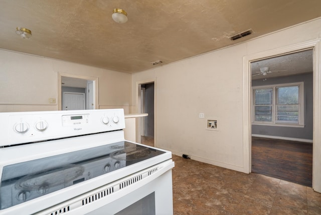 kitchen with wood-type flooring, ceiling fan, and white electric stove