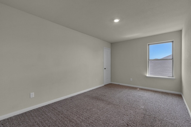 unfurnished room with carpet