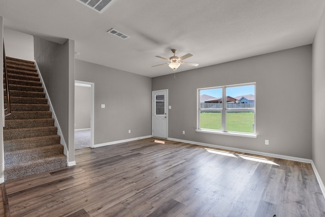 spare room featuring ceiling fan and hardwood / wood-style flooring