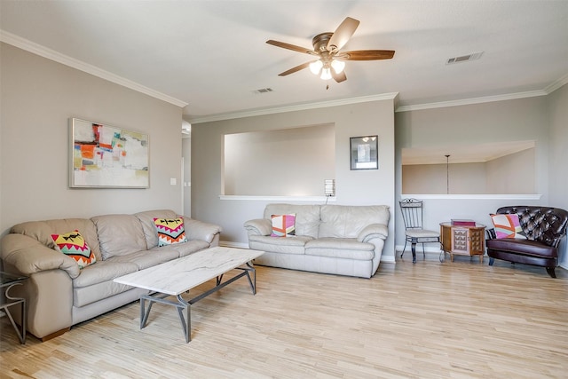 living room with crown molding, light hardwood / wood-style floors, and ceiling fan