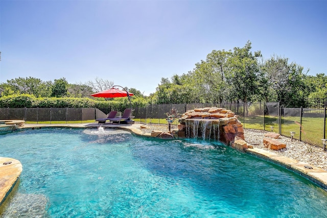 view of swimming pool featuring pool water feature