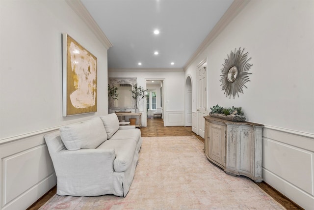 living room with ornamental molding