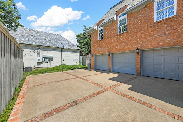 garage featuring central air condition unit