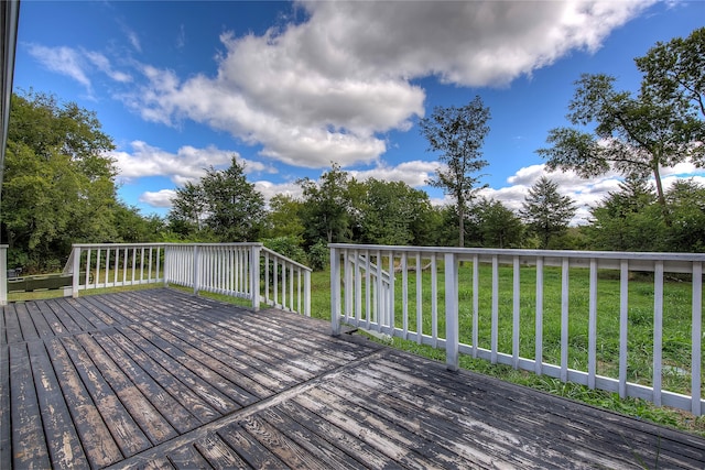 deck featuring a yard