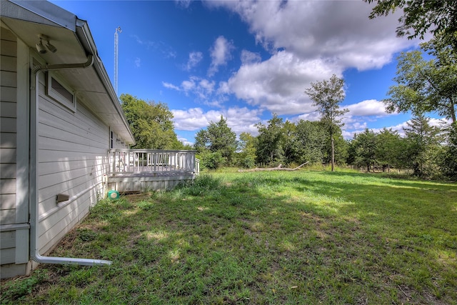 view of yard featuring a deck