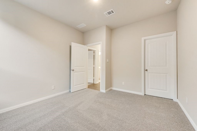 empty room with light carpet