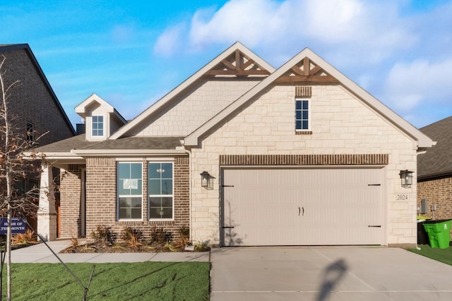 craftsman inspired home with a garage