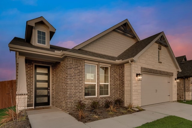 view of front of home with a garage