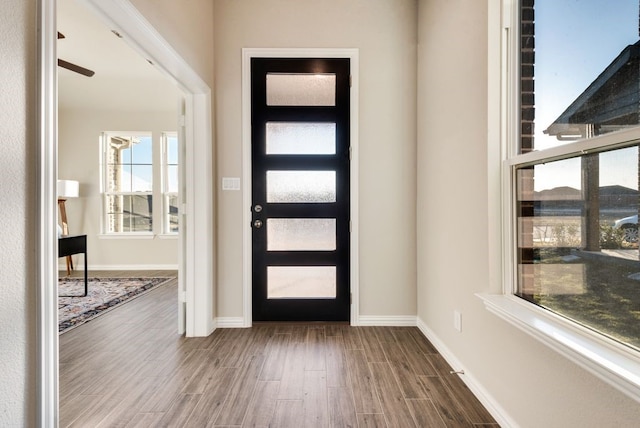 entrance foyer featuring ceiling fan