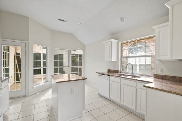 kitchen featuring dishwasher, white cabinetry, a healthy amount of sunlight, and sink