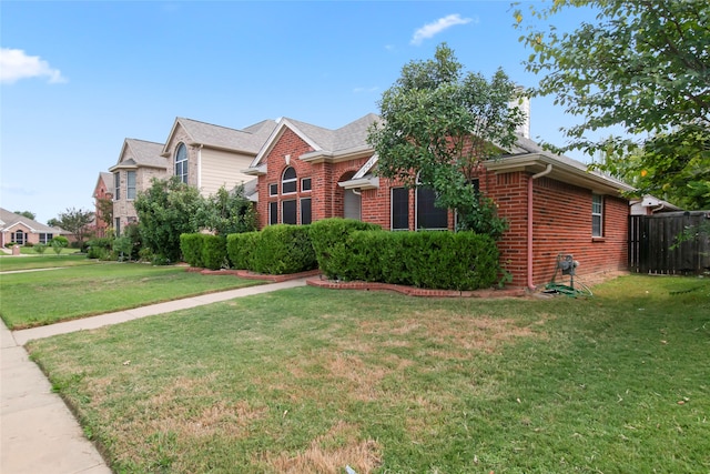 view of front of house with a front lawn