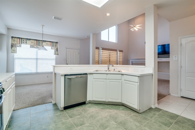 kitchen featuring appliances with stainless steel finishes, ceiling fan, sink, light tile patterned floors, and white cabinetry