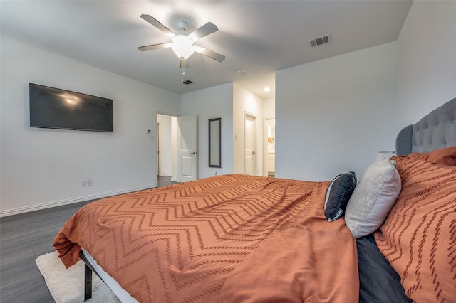 bedroom featuring dark wood-type flooring and ceiling fan