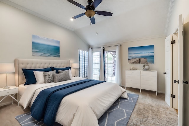 bedroom with lofted ceiling, carpet flooring, ceiling fan, and ornamental molding