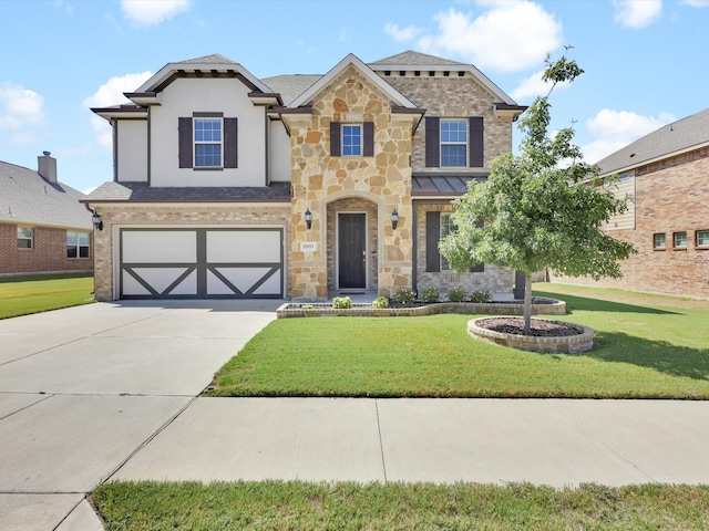 view of front of property with a garage and a front lawn