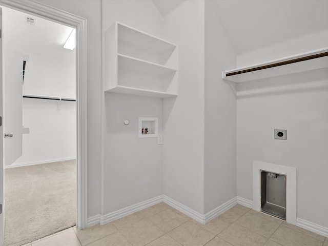 washroom with washer hookup, light colored carpet, gas dryer hookup, and electric dryer hookup