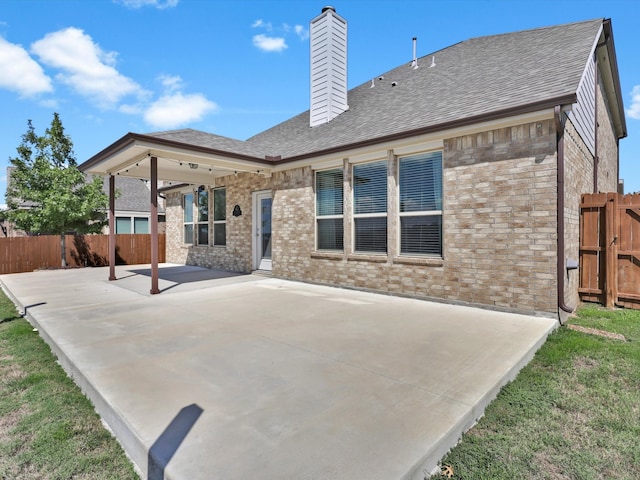 rear view of property with a patio