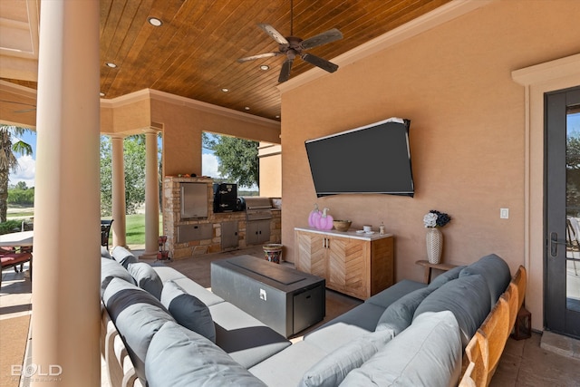 view of patio with area for grilling, an outdoor living space, and ceiling fan