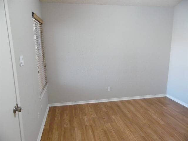 empty room with light wood-type flooring