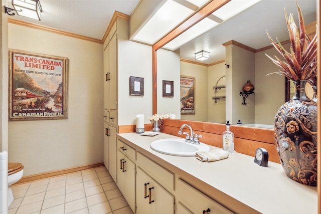 bathroom with a textured ceiling, toilet, tile patterned floors, vanity, and crown molding