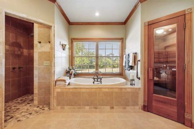 bathroom with tile patterned floors, crown molding, and shower with separate bathtub