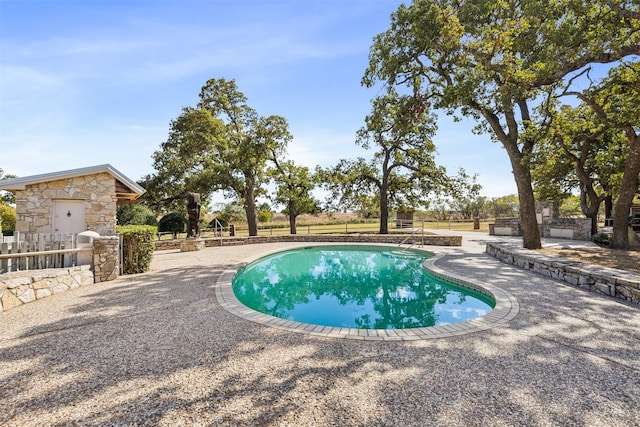 view of pool with a patio