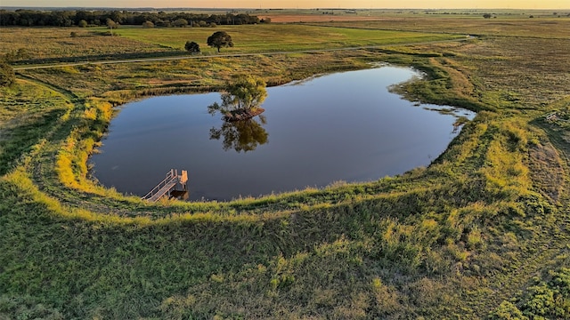 aerial view featuring a rural view and a water view